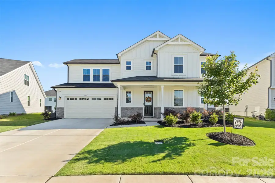 Front exterior of a new home in Waxhaw Landing, Monroe, NC, highlighting curb appeal (Image 21). Front exterior of a new home in Waxhaw Landing, Monroe, NC, highlighting curb appeal (Image 21).