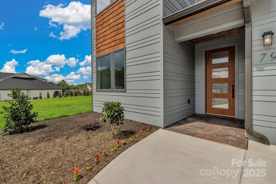 Exterior details and patio area of a home in , Asheville (Image 33). Exterior details and patio area of a home in , Asheville (Image 33).