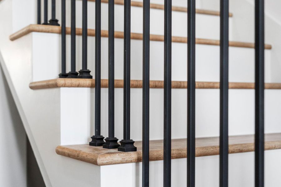 Wrought iron spindles add sophistication