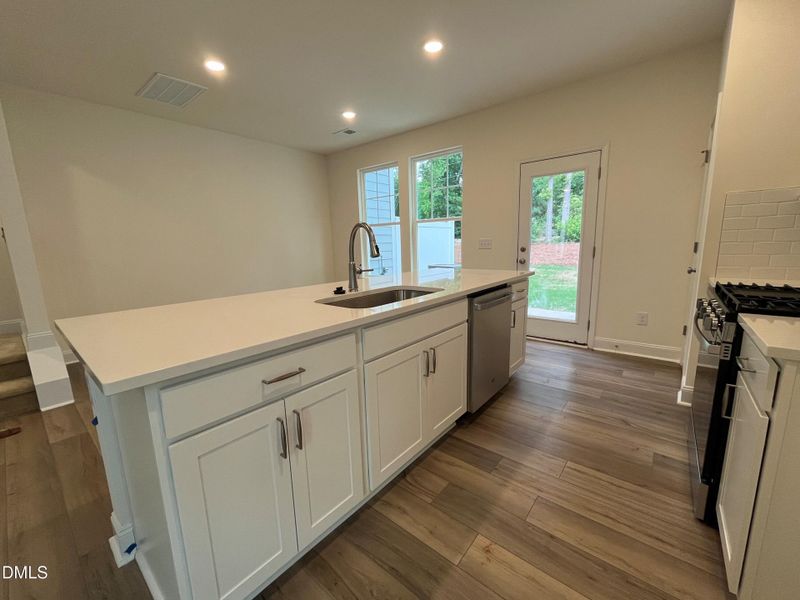 Kitchen leading to back patio