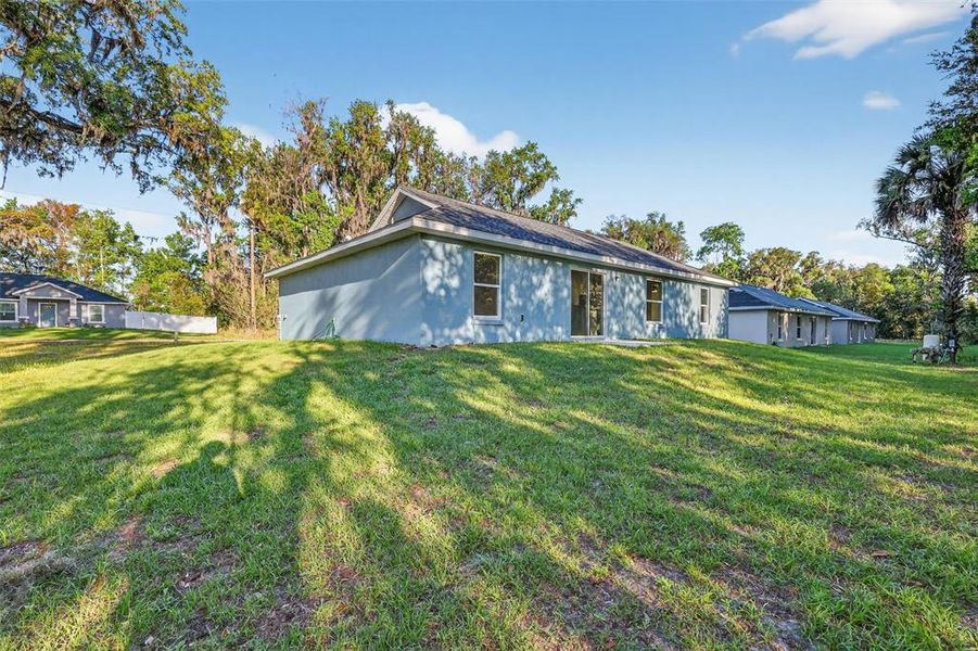 Exterior details and patio area of a home in , Summerfield (Image 15).