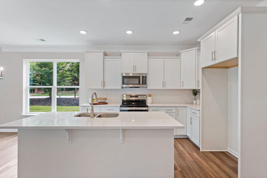 Furnished interior view inside a new home in East Main Townes, Spartanburg (Image 8). Furnished interior view inside a new home in East Main Townes, Spartanburg (Image 8).
