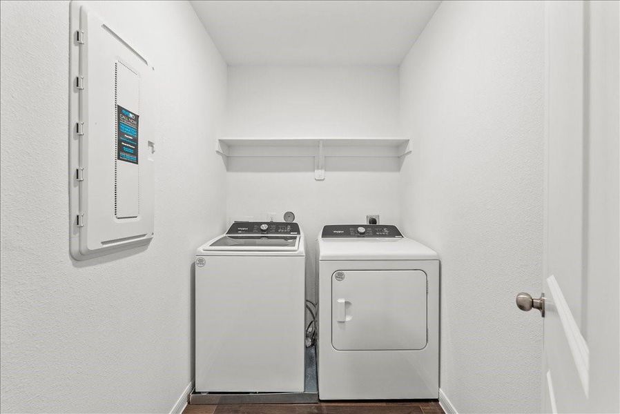 View of Utility Room with a washer and dryer staying with the home.