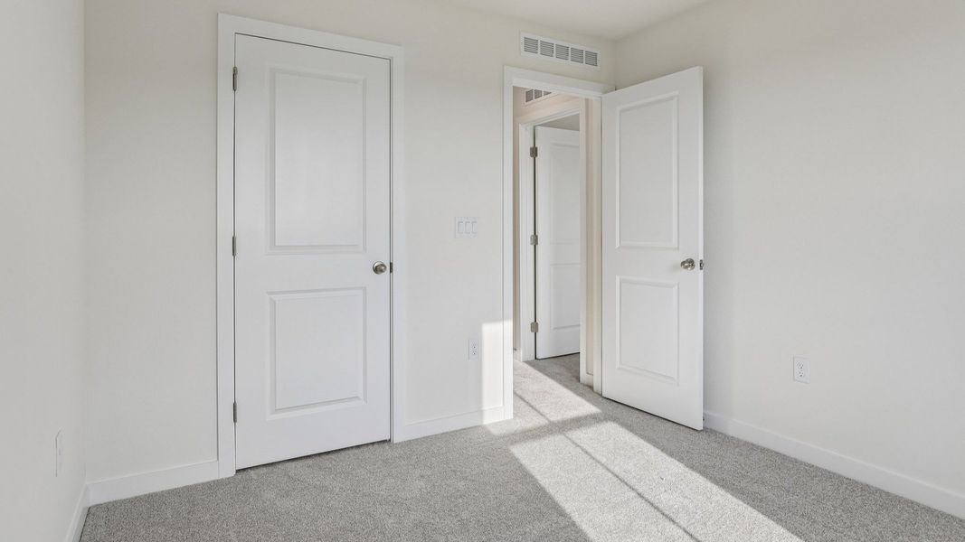 Furnished interior view inside a new home in Cyrene at Harmony, St. Cloud (Image 16).