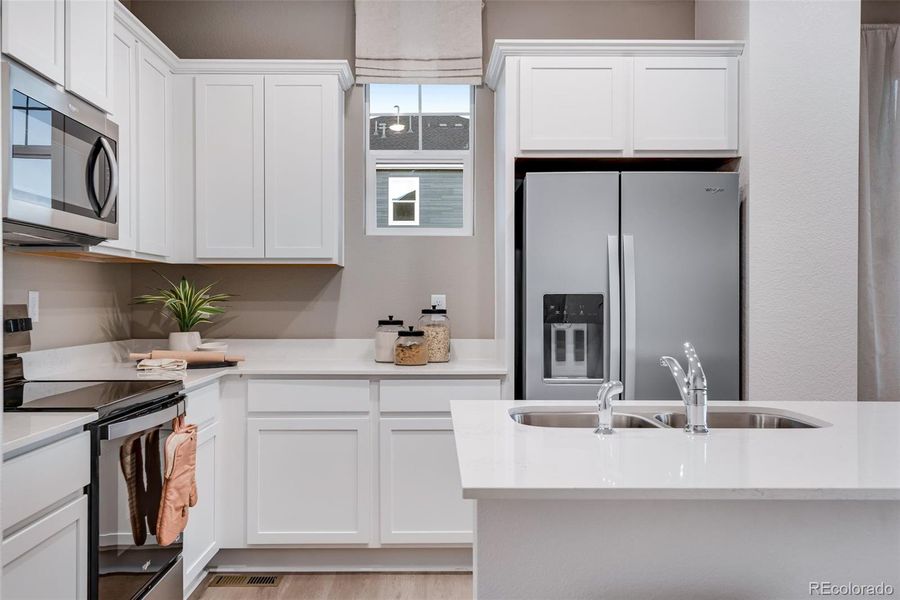Furnished interior view inside a new home in Vista Meadows, Fort Lupton (Image 3).