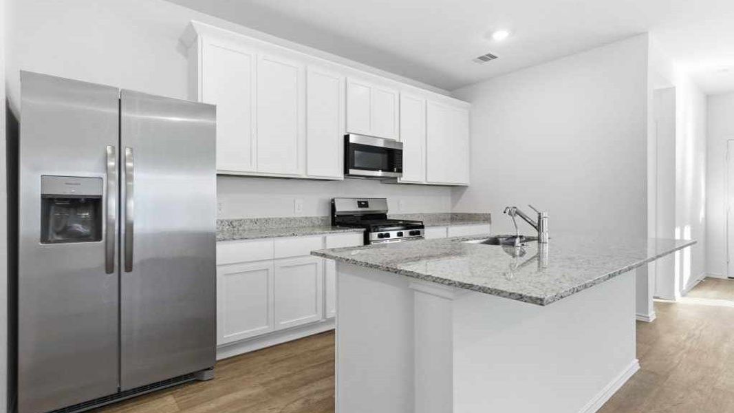 Furnished interior view inside a new home in Tamarron, Fulshear (Image 5).