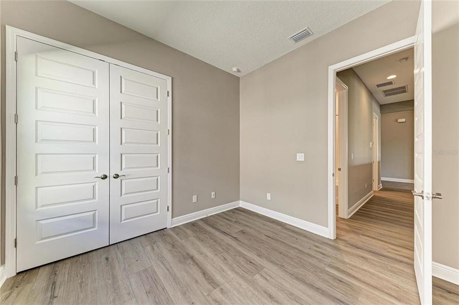 Spacious, unfurnished interior of a new home in North River Ranch, Parrish (Image 21).