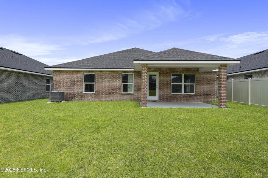 Front exterior of a new home in Shadow Crest at Rolling Hills, Green Cove Springs, FL, highlighting curb appeal (Image 15). Front exterior of a new home in Shadow Crest at Rolling Hills, Green Cove Springs, FL, highlighting curb appeal (Image 15).