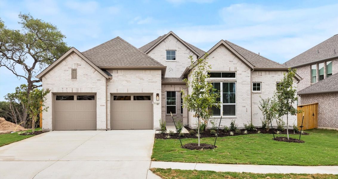 Representative exterior photo of a completed home built from the Draco by Chesmar Homes in Sunfield, Buda, TX (Image 1).