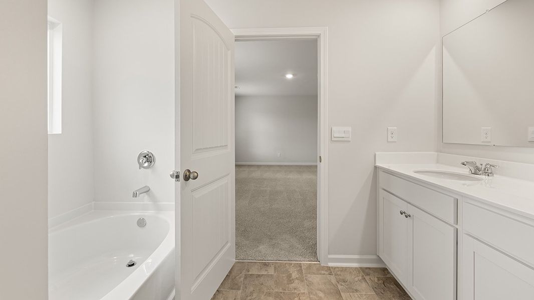 Representative furnished interior of a home built from the Hanover by D.R. Horton in Creekview, Atlanta (Image 11).