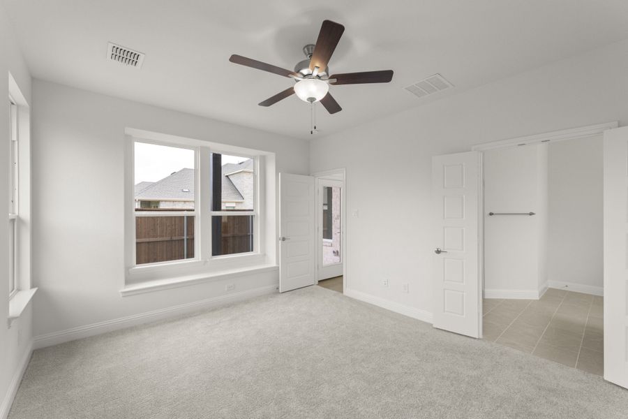 Spacious, unfurnished interior of a new home in The Reserve at Spiritas Ranch, Little Elm (Image 26).