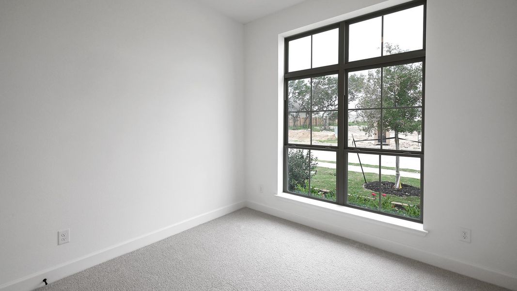 Spacious, unfurnished interior of a new home in 6 Creeks, Kyle (Image 6).