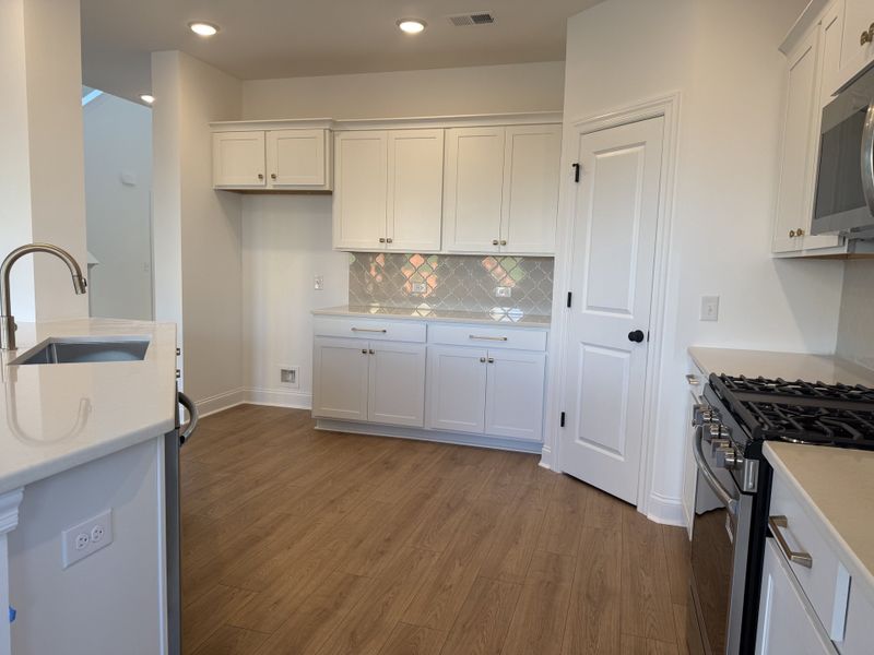 Furnished interior view inside a new home in Nexus – Park Collection, Gallatin (Image 10).