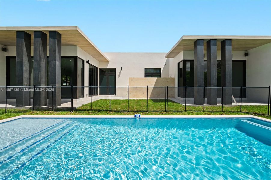 Front exterior of a new home in , Miami, FL, highlighting curb appeal (Image 21). Front exterior of a new home in , Miami, FL, highlighting curb appeal (Image 21).