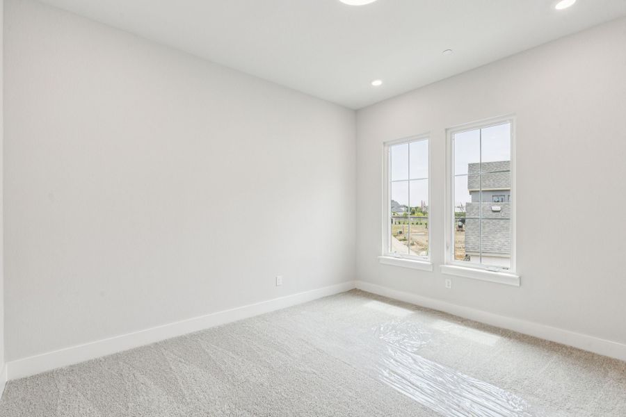 Representative unfurnished interior of a home built from the Hamilton by Centre Living Homes in Newman Village Townhomes, Frisco (Image 23).