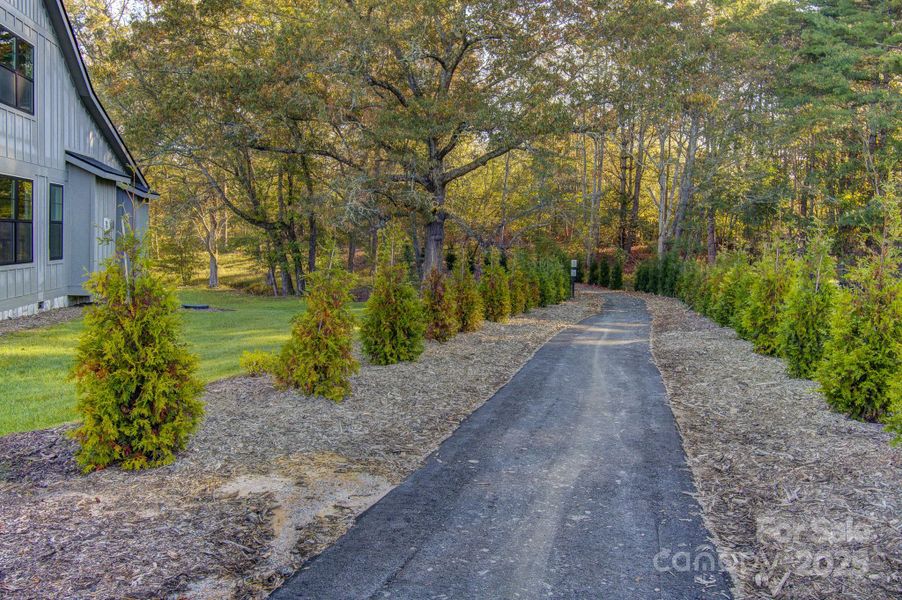 Front exterior of a new home in , Mills River, NC, highlighting curb appeal (Image 16).
