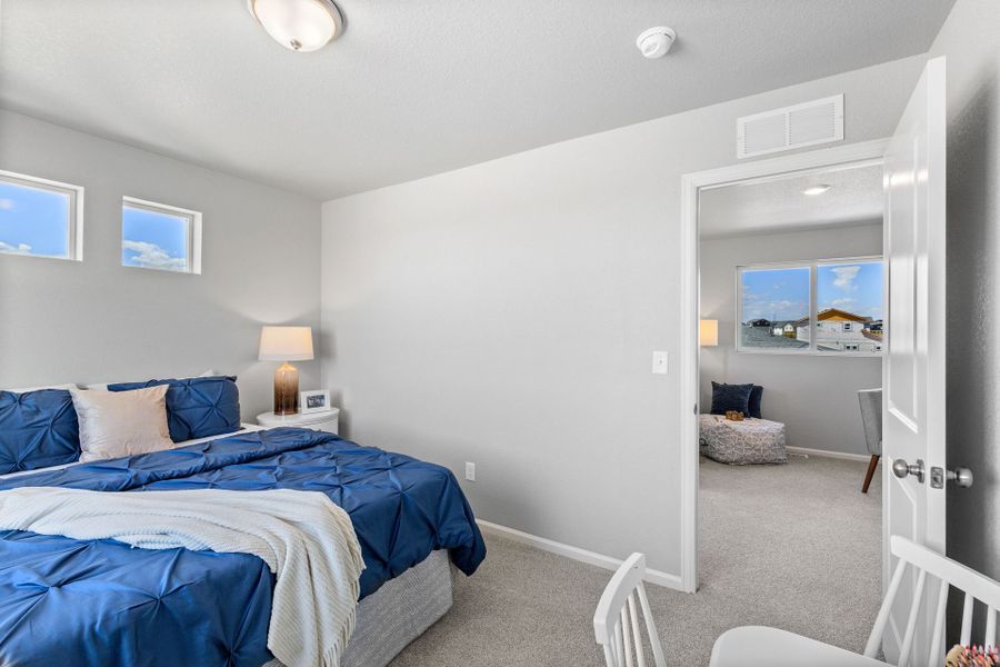 Furnished interior view inside a new home in Green Valley Ranch, Aurora (Image 27).