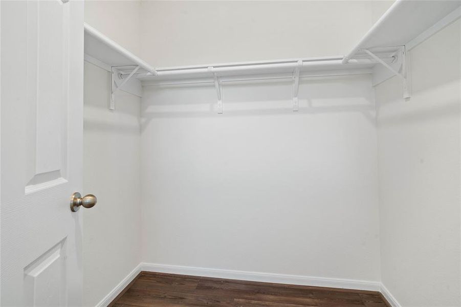 Look at this immaculate closet! With high shelving, multiple rows to hang clothing, you are sure to have enough room for all your belongings!