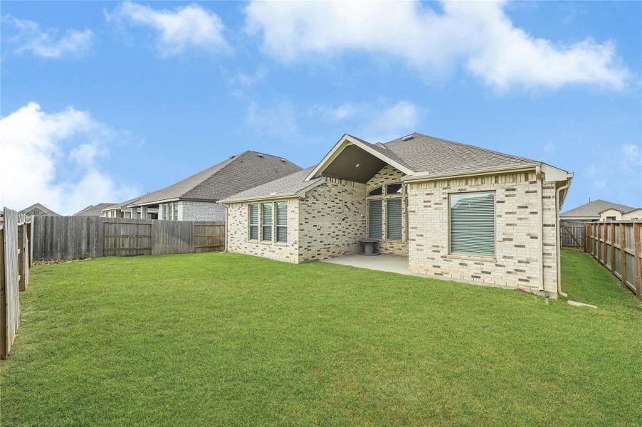 Front exterior of a new home in Lago Mar, Texas City, TX, highlighting curb appeal (Image 25). Front exterior of a new home in Lago Mar, Texas City, TX, highlighting curb appeal (Image 25).