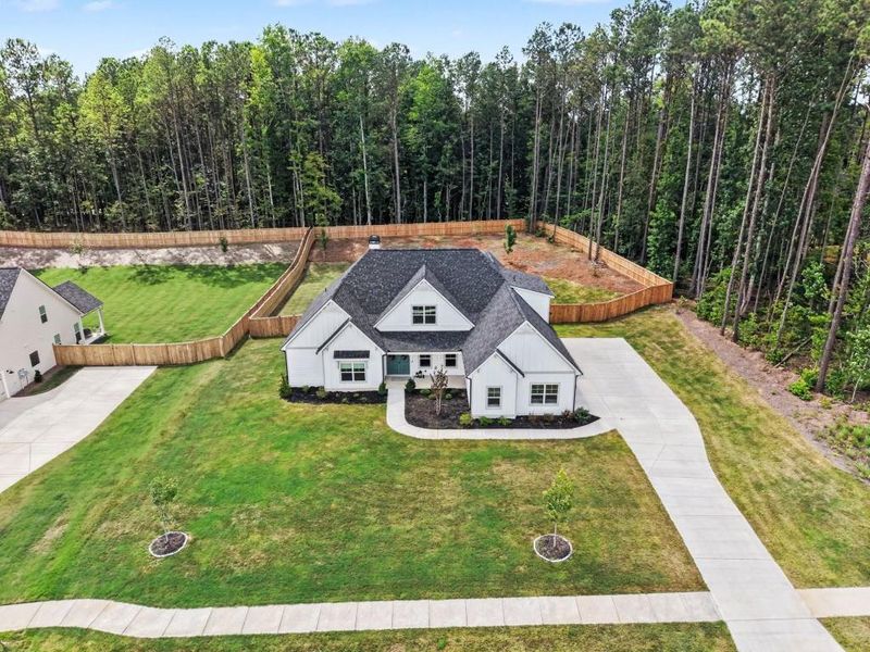 Front exterior of a new home in Belle Hall, Newnan, GA, highlighting curb appeal (Image 26).