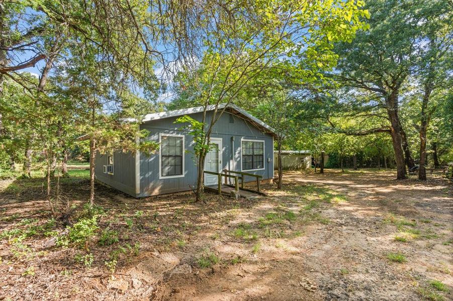Front exterior of a new home in , Covington, TX, highlighting curb appeal (Image 17). Front exterior of a new home in , Covington, TX, highlighting curb appeal (Image 17).