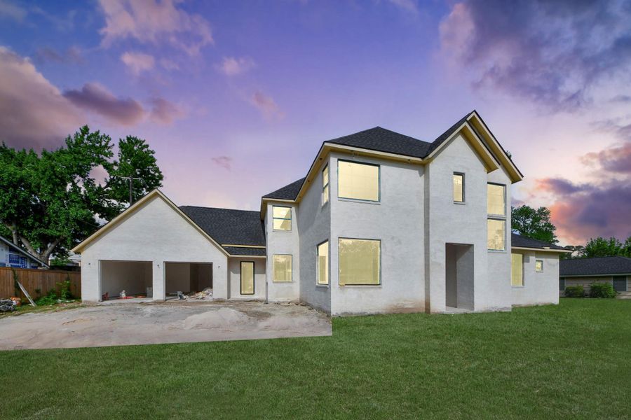Front exterior of a new home in , Houston, TX, highlighting curb appeal (Image 12).