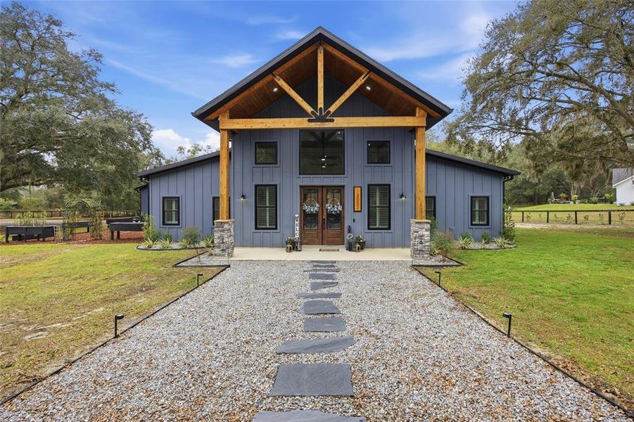 Front exterior of a new home in , Belleview, FL, highlighting curb appeal (Image 2). Front exterior of a new home in , Belleview, FL, highlighting curb appeal (Image 2).