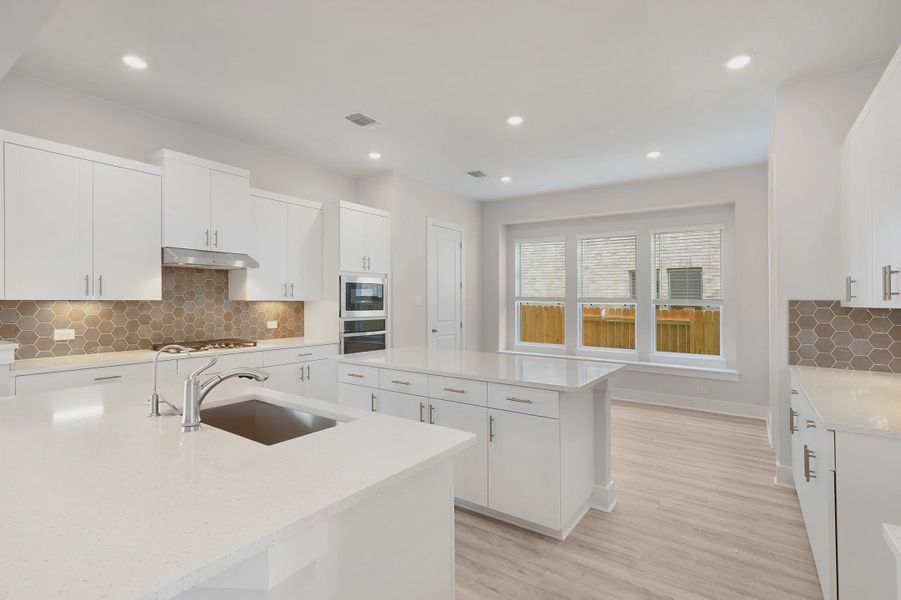 Representative furnished interior of a home built from the Archer by Chesmar Homes in Santa Rita Ranch, Liberty Hill (Image 4).