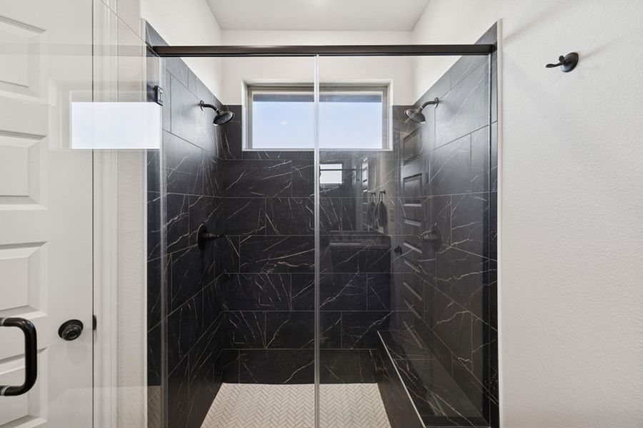 Bathroom with a marble finish shower Bathroom with a marble finish shower