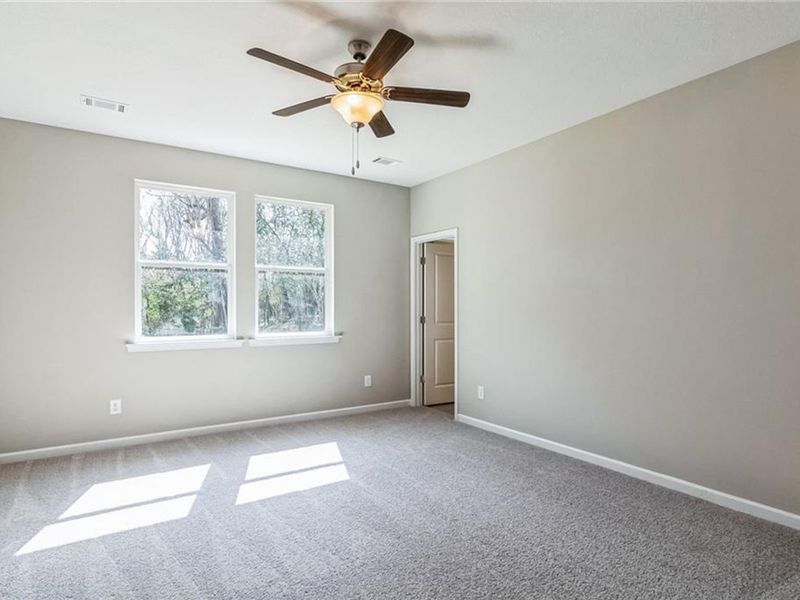 Spacious, unfurnished interior of a new home in Ivy Glen, Perry (Image 14).