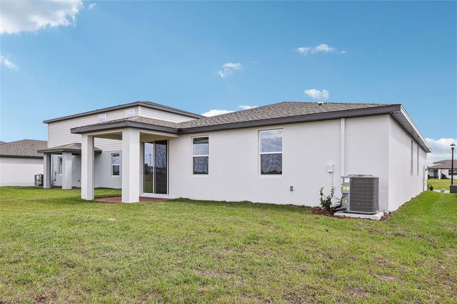 Exterior details and patio area of a home in The Meadow at Crossprairie, St. Cloud (Image 20). Exterior details and patio area of a home in The Meadow at Crossprairie, St. Cloud (Image 20).