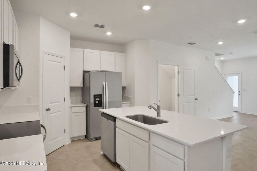 Furnished interior view inside a new home in Atlantis Pointe, Middleburg (Image 4).