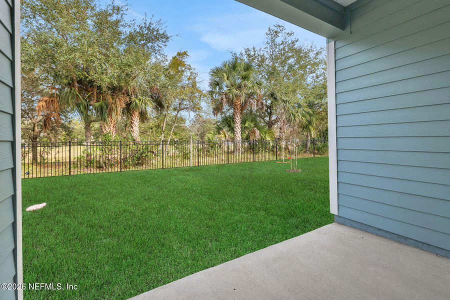 Exterior details and patio area of a home in The Hammock at Palm Harbor, Palm Coast (Image 3).