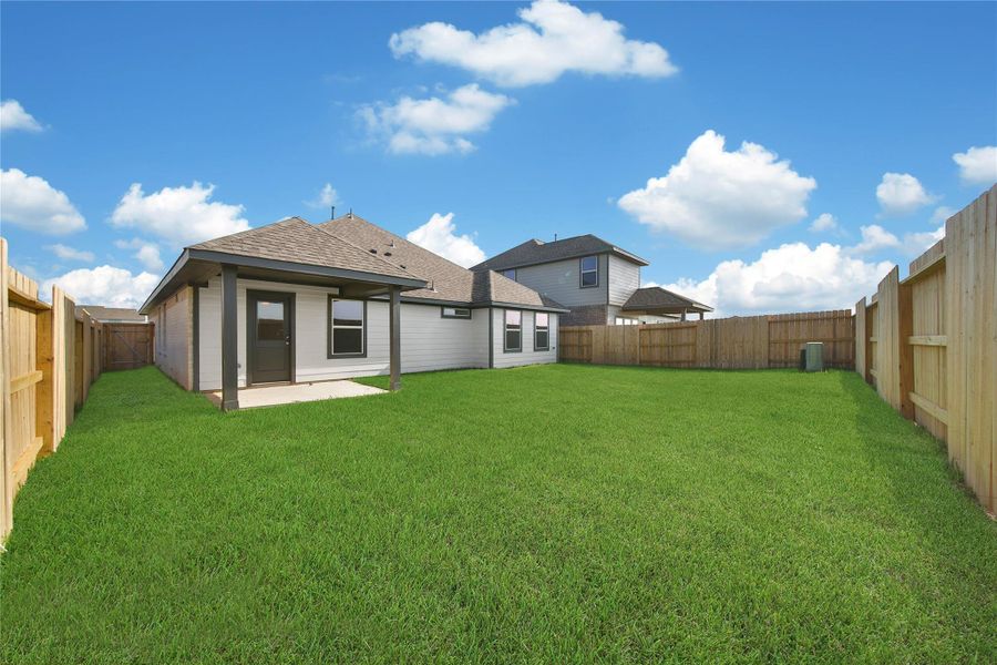 Exterior details and patio area of a home in , Rosharon (Image 18). Exterior details and patio area of a home in , Rosharon (Image 18).