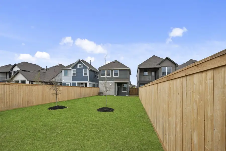 Exterior details and patio area of a home in Bridgeland, Cypress (Image 3).