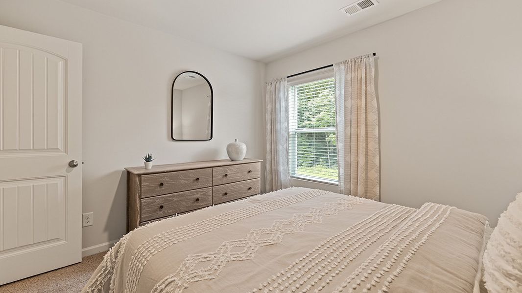 Representative furnished interior of a home built from the ROBIE by D.R. Horton in Pointe Park, Union City (Image 39).