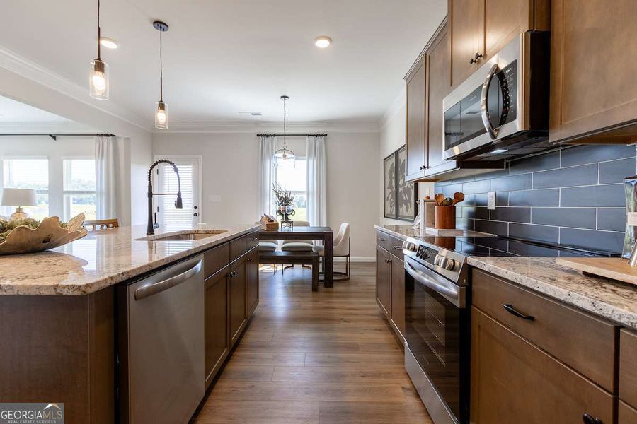 Furnished interior view inside a new home in Bryson Farms, Byron (Image 9).
