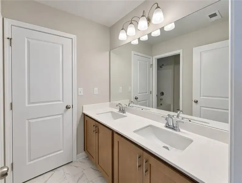 Furnished interior view inside a new home in Kingsmere Estates, Loganville (Image 11).