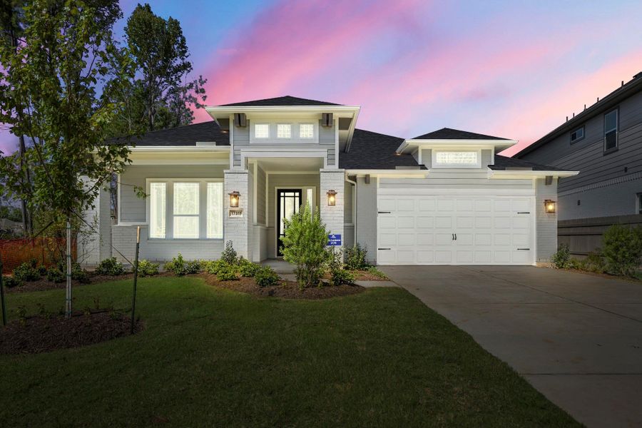 Front exterior of a new home in ARTAVIA 55' Lots, Conroe, TX, highlighting curb appeal (Image 1). Front exterior of a new home in ARTAVIA 55' Lots, Conroe, TX, highlighting curb appeal (Image 1).