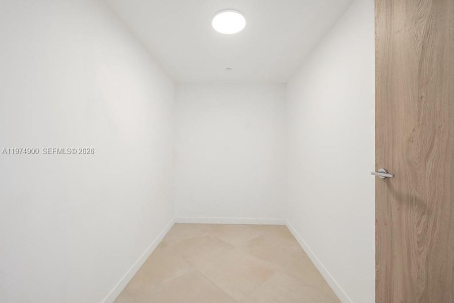 Spacious, unfurnished interior of a new home in , Bay Harbor Islands (Image 34).