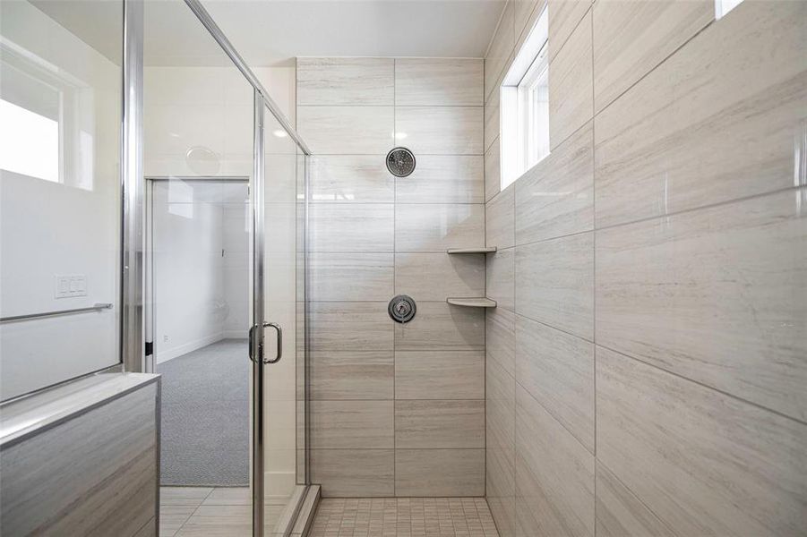 Bathroom featuring a stall shower