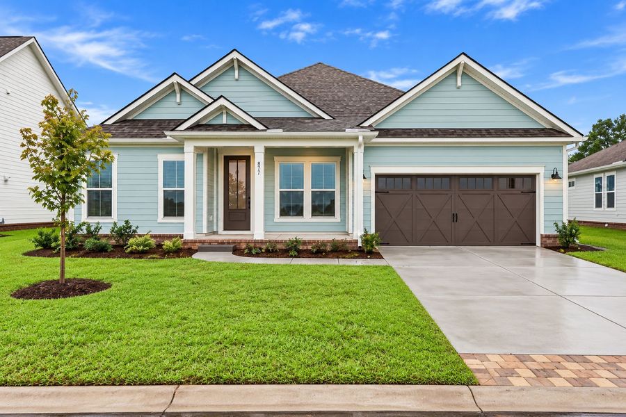 Front exterior of a new home in Indigo Bay, Myrtle Beach, SC, highlighting curb appeal (Image 27).