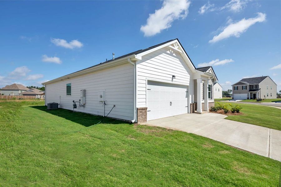 Representative exterior photo of a completed home built from the Aria by D.R. Horton in The Abbey at Trolley Run Station, Aiken, SC (Image 16).