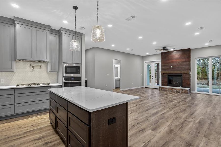 Kitchen opens up to spacious living area!