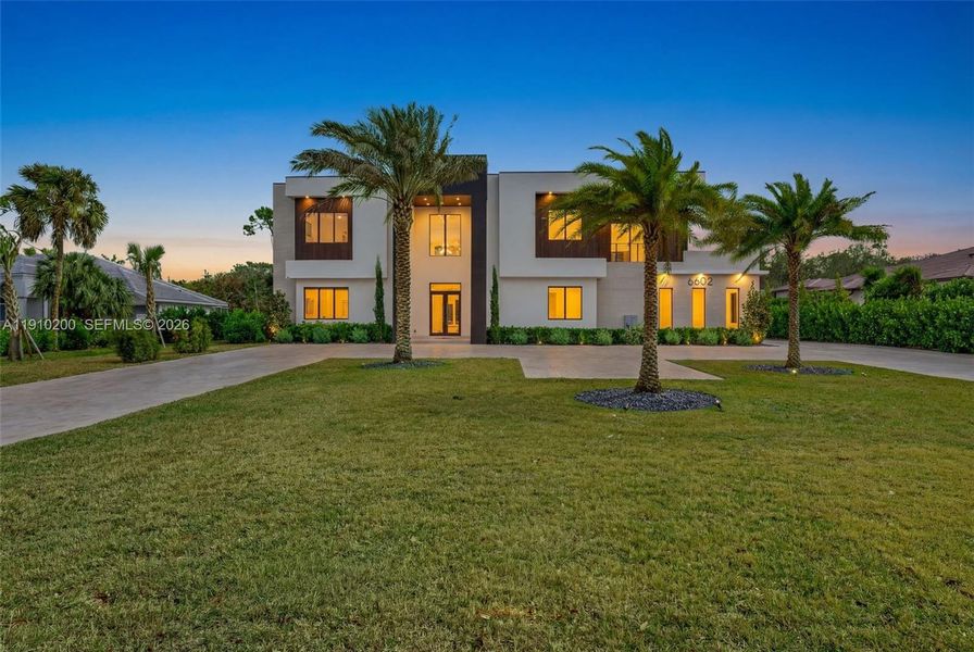 Front exterior of a new home in , Parkland, FL, highlighting curb appeal (Image 25).