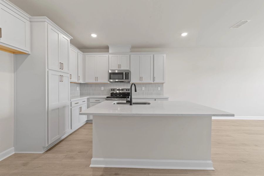 Furnished interior view inside a new home in Blue Heron Retreat, Little River (Image 6).