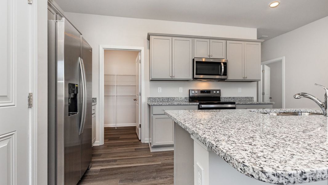 Furnished interior view inside a new home in Sandridge Park, Little River (Image 8).