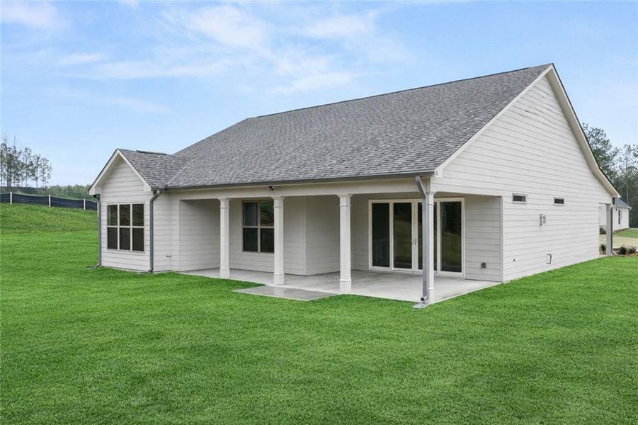 Exterior details and patio area of a home in Soleil Belmont Park, Canton (Image 29).
