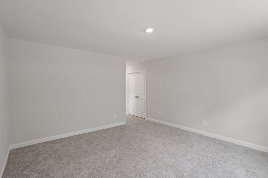 Spacious, unfurnished interior of a new home in Sweetbrier, Durham (Image 27).