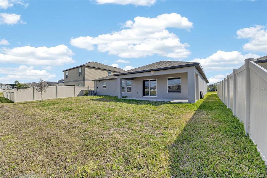 Exterior details and patio area of a home in Balm Grove, Wimauma (Image 34).
